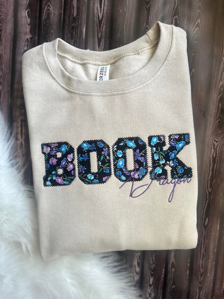 Book Dragon Embroidered Sweater